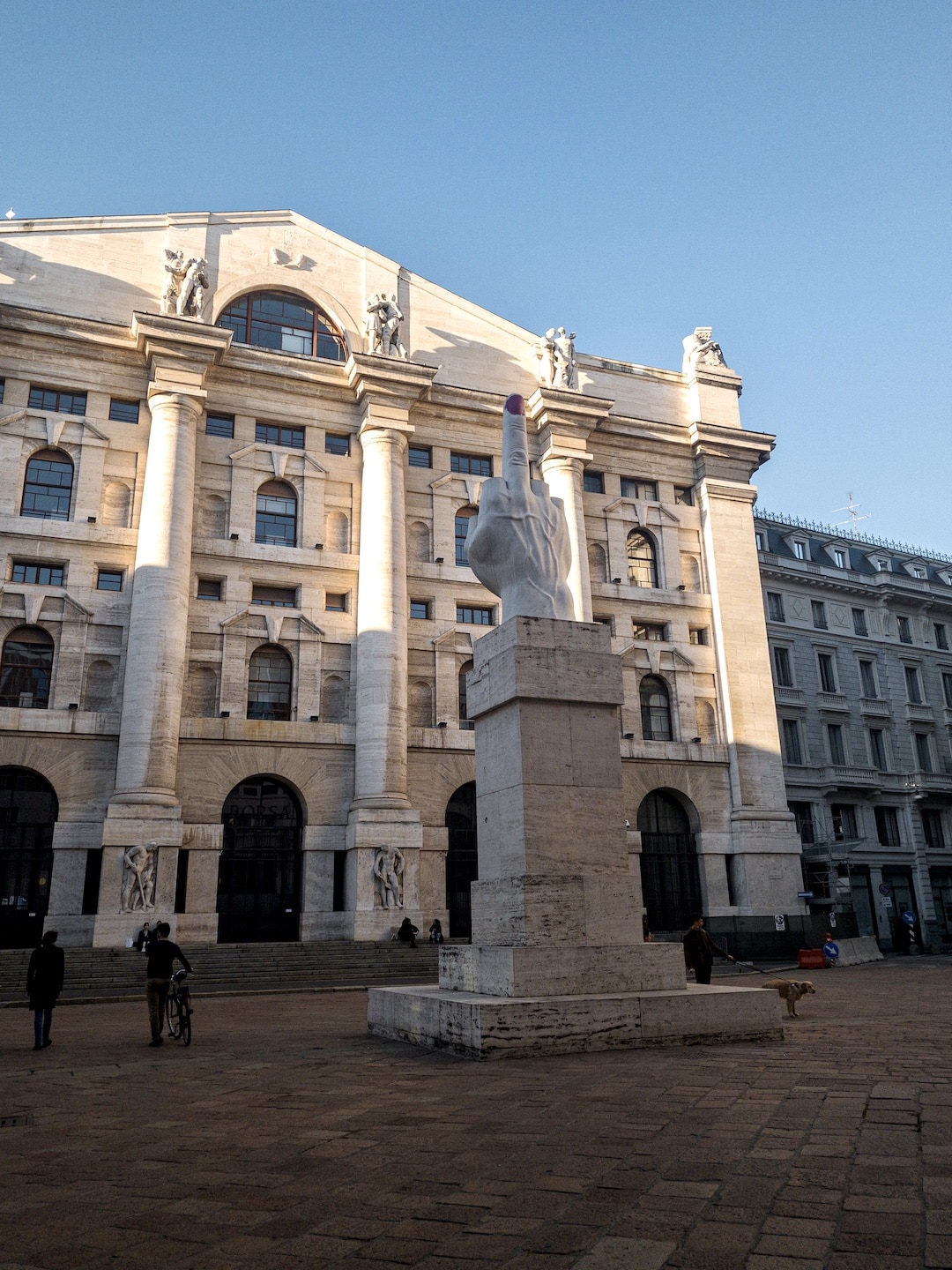 Cattelan sculpture LOVE Milan Piazza Affari