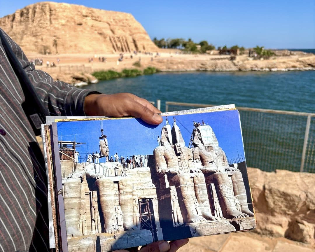 Historic photograph of Abu Simbel during dismantling shown on site in front of the relocated temple, illustrating the UNESCO rescue project