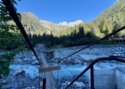 Walking the Bridge at Chalaadi Glacier Trailhead