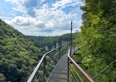 Suspended steel skywalk at Okatse Canyon